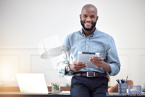 Image of Tablet, portrait and happy business man in office for online management, social media and website planning. Professional employee or african person at startup company working on digital technology