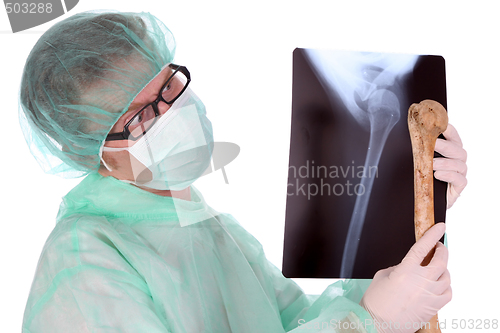 Image of surgeon with xray and bone