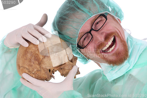 Image of surgeon with skull