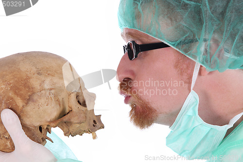 Image of surgeon with skull