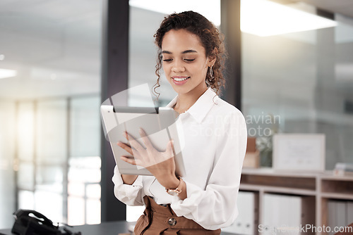 Image of Tablet, business woman and accountant in office, smile and working on project. Technology, professional and African female entrepreneur, auditor or person research for accounting, email and web app.