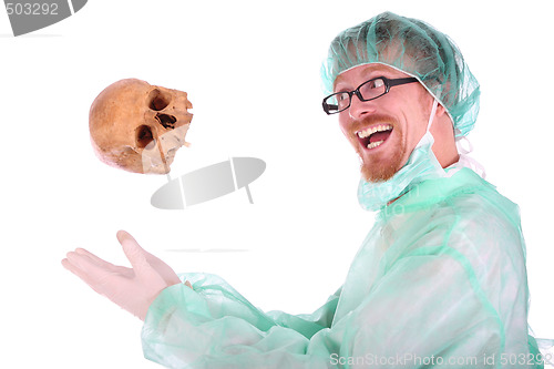 Image of surgeon with skull