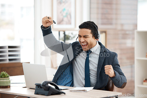 Image of Excited businessman, fist and telemarketing success with celebration and work promotion email. Male worker, win and good news on laptop in office with motivation at call center job with cheering