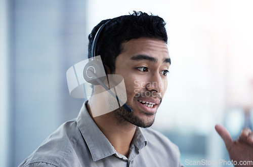 Image of Talking, call center and business man telemarketing, customer service and support in office. Crm, contact us and Asian male sales agent, consultant and professional working, consulting or help desk