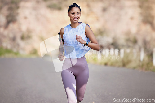 Image of Road, running and woman with fitness, exercise and workout goal with wellness, health and progress. Female person, athlete and runner in the street, sports and training with energy, speed and cardio