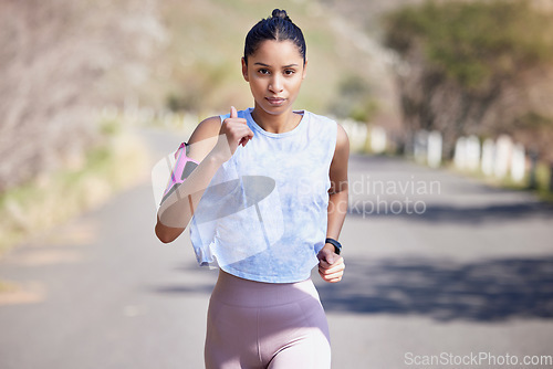 Image of Running, portrait and serious woman for outdoor fitness, exercise and cardio, marathon training and speed. Fast, focus and runner, athlete or female person for sports workout and challenge in street