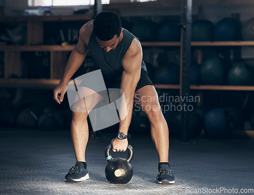 Image of Exercise, kettlebell and man with fitness, workout goal and training with wellness, health and progress. Male person, guy and athlete with gym equipment, strong and sports with energy and challenge