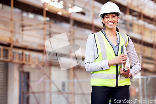 Image of Portrait, engineer and woman with construction, business and smile with inspection, vest and helmet. Face, female person or employee with safety, documents and builder with a hard hat or architecture