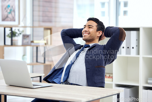 Image of Relax, stretching and happy business man on laptop at desk in planning, working and office or job goals. Break, computer and productivity of employee, corporate worker or person and hands behind head