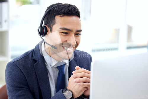 Image of Call center, insurance agent and business man consulting on video call doing telemarketing with a smile in an office. Computer, contact us and customer service employee talking, support or helping