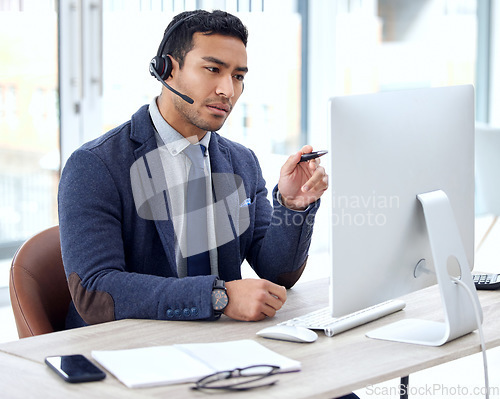 Image of Call center, computer and business man, IT consultant or technical support agent talk, communication and advice. Helping, callcenter and solution of asian person on desktop for information technology