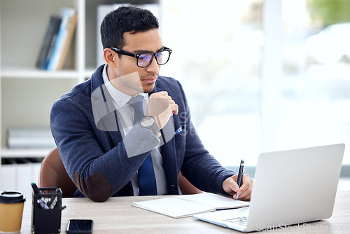 Image of Thinking, writing and business man on laptop in office planning, notebook brainstorming and online research. Ideas, journal notes and corporate person on computer schedule, reminder or project goal