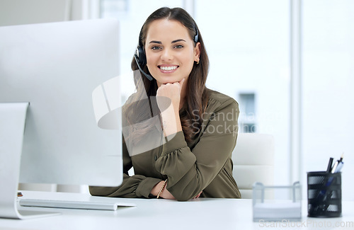 Image of Woman in portrait, call center and smile with contact us, communication and CRM with tech support. Customer service, help desk and telemarketing with happy female consultant at computer with telecom