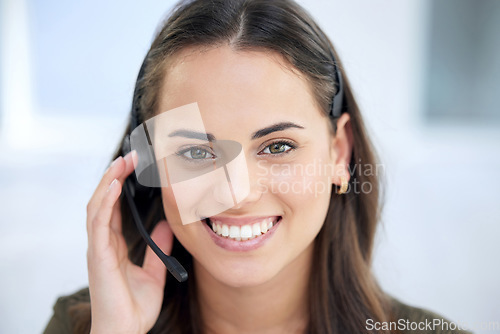 Image of Happy woman in portrait, call center and contact us with communication and CRM with tech support. Customer service, help desk and telemarketing with female consultant and smile on face with telecom