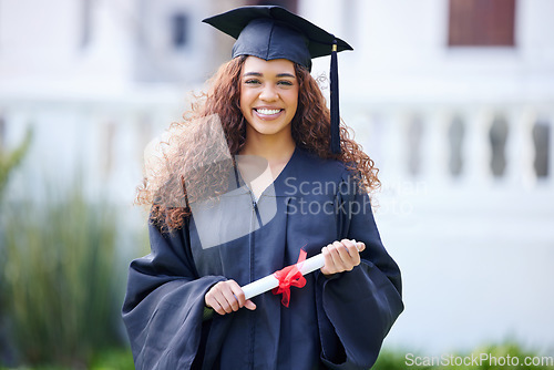 Image of Success, portrait of college student and on graduation day at her campus outside with her certificate. Achievement, graduate and happy female person smile with her diploma at university outdoors