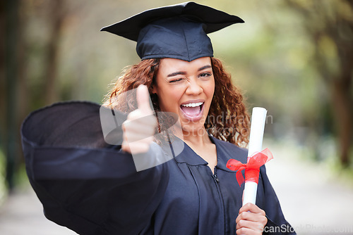 Image of Thank you, portrait of college student with thumbs up and winking for success at her campus outdoors. Achievement, graduate and female person with her certificate or diploma at university outside