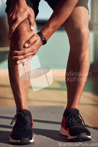 Image of Fitness, exercise and legs of man with knee pain in gym with injury after running, training and workout. Medical accident, wellness and closeup of male person for muscle strain, joint ache and hurt