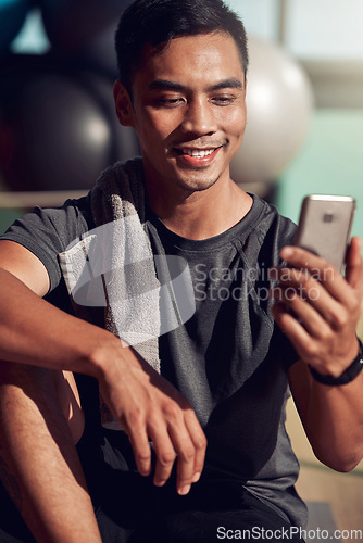 Image of Fitness, selfie and man on floor with phone for health update on social media, happiness and gym motivation. Mobile app, cellphone and workout, male with smile on ground in pilates or yoga studio.