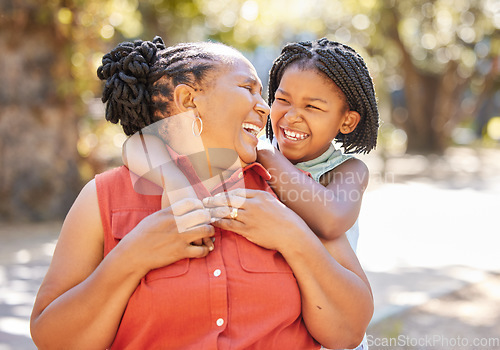Image of Happy, grandmother or girl laughing in park relaxing or smiling in nature on holiday vacation as a family. Funny joke, granny or senior black woman or child loves bonding or hugging African grandma