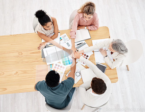 Image of Diversity, top view of colleagues hands stack and planning in meeting at office. Hand together for collaboration or teamwork, brainstorming or goals and group with motivation, strategy and support