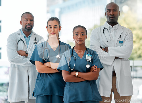 Image of Hospital, teamwork and portrait of doctors with crossed arms for medical care, wellness and support. Healthcare, clinic and men and women health worker for cardiology service, consulting or insurance