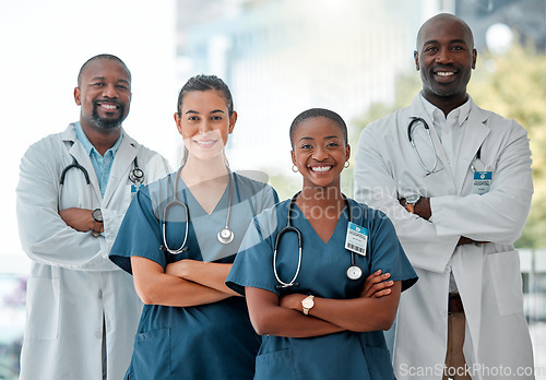 Image of Healthcare, teamwork and portrait of doctors with crossed arms for medical care, wellness and support. Hospital, happy and men and women health worker for cardiology service, consulting and medicare