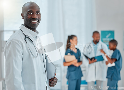 Image of Hospital, doctor and portrait of black man with smile for medical care, wellness and support. Healthcare, clinic teamwork and face of happy male health worker for service, consulting and insurance