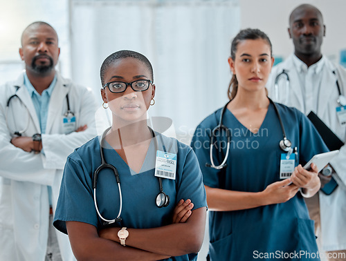 Image of Hospital, teamwork and portrait of serious doctors with crossed arms for medical care, wellness and support. Healthcare, clinic and men and women workers for service, consulting and surgery in clinic