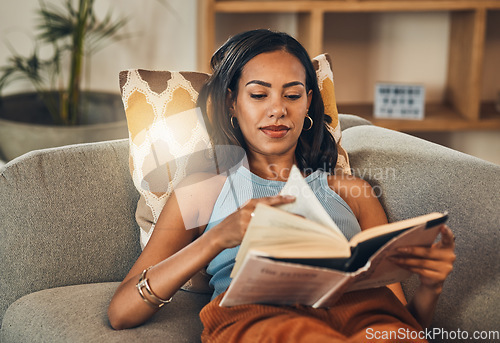 Image of Woman relax on couch, reading book at house and break on the weekend with literature, fantasy story and peace. Female person with hobby, leisure and chill at home, read for knowledge and information