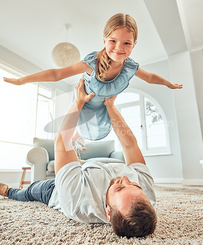 Image of Portrait, dad and child in home for flying game, bonding and playful girl in living room for happy family. Happiness, father and daughter play airplane on floor with smile, support and love in house