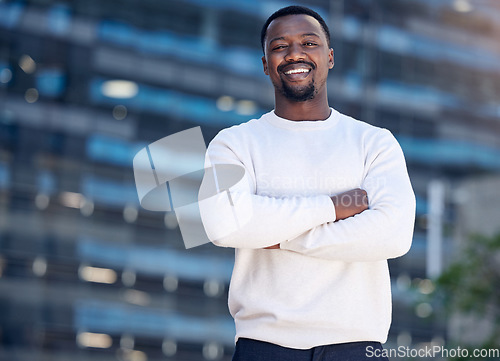 Image of City, happy and portrait of a black man with arms crossed for work, creative expert and happiness. Smile, graphic designer and an African businessman in an urban town with confidence and proud