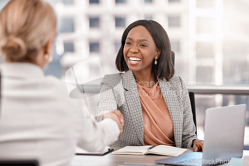 Image of Young, businesswoman and shake hands or meeting management or interview for new job and in the office. Partnership, human resource and female worker hired or success or team approved in the workplace