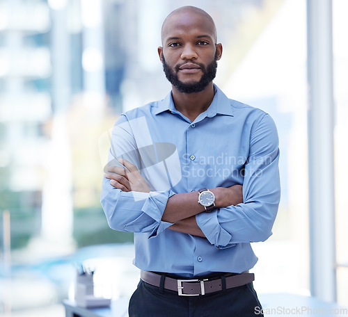 Image of Black man, business expert and portrait with company serious and arms crossed in office. Worker, boss and African male person with corporate career confidence and professional ready for ceo work