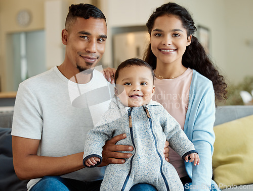 Image of Family, smile and portrait of baby in home living room, bonding and having fun in house. Father, mother and face of child on sofa, relax with newborn and enjoying quality time together with happiness