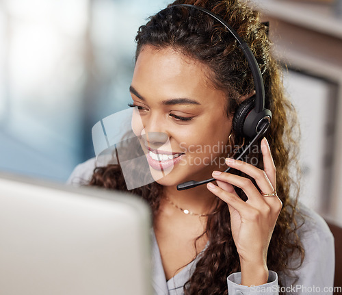 Image of Young woman, call center and listening with computer, microphone or smile for telemarketing job. Happy female consultant, face and headphones for customer service, technical support and crm at agency