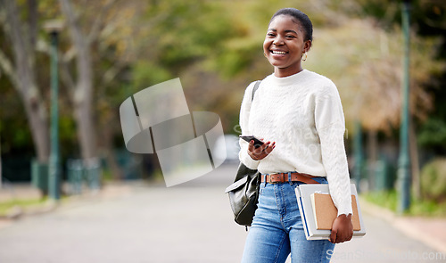 Image of Portrait, phone and mockup with a student black woman on her commute to university campus for education. Mobile, social media and books with a female college pupil checking for her next lecture