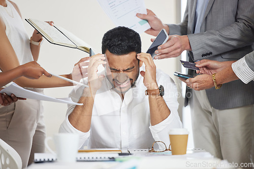 Image of Business, stress and man with a headache, multitasking and anxiety with documents, deadline and demand. Male person, consultant and employee with a migraine, overworked or burnout with depression