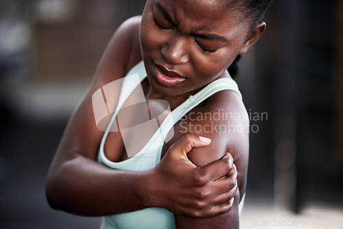 Image of Sports, health and woman with shoulder injury or pain or workout accident and on mockup. Fitness, train and African female athlete with a medical emergency or sprain muscle after a cardio exercise.