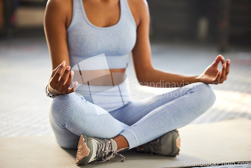 Image of Meditation, yoga and hands of woman in gym for wellness, mindfulness and breathing exercise on floor. Mental health, meditate and female person in lotus pose for calm, zen and balance in fitness