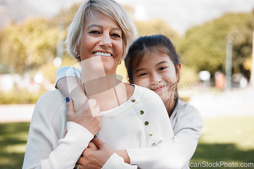 Image of Girl, grandmother and portrait with happiness in the outdoor on the weekend in nature. Kid, grandma and hug in summer with smile on face for love and family in the garden with pride, care and bond.