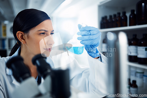 Image of Research, liquid and woman scientist in laboratory with medical, sample and analysis. Healthcare, medicine and lady expert in lab with fluid for vaccine, cure or futuristic, innovation or solution