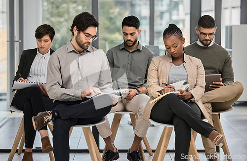 Image of Meeting, listening or business people writing notes in presentation for education or coaching in company. Mentorship, learning or team of employees taking note of group training in notebook in office