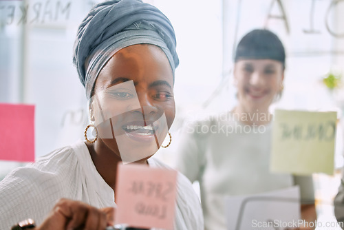 Image of Teamwork, planning and business people on glass board in brainstorming, project workflow and happy for goals. Diversity employees or African woman ideas, collaboration and solution on sticky notes