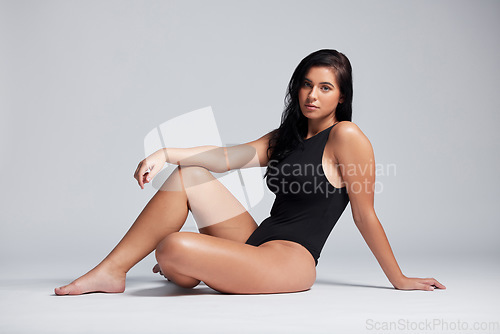 Image of Model, woman and portrait with body sitting in underwear in white studio background for fashion, beauty or skincare mockup. Person, face and hair removal for swimwear, summer swimming clothing