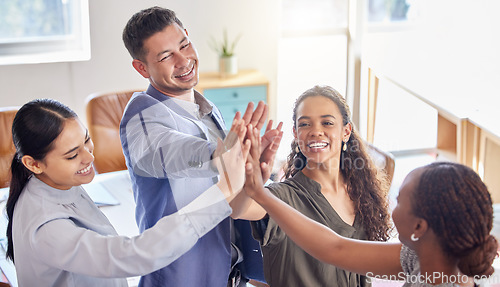 Image of Business people, meeting and high five for teamwork, agreement or collaboration in unity at the office. Happy group of employees touching hands in team building, motivation or celebration for goals