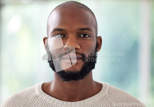 Image of Face, serious and black man at creative business, startup and career mindset, confident and casual on blurred background. Portrait or headshot of a young African person, worker or entrepreneur in USA