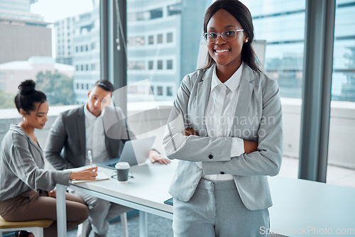 Image of Portrait, arms crossed and black woman, lawyer and entrepreneur in meeting. Face, glasses and business smile of African female law professional with confidence, career pride and leadership in office.