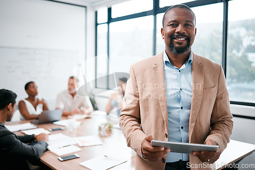 Image of Black man in business, smile in portrait and tablet, leadership and presentation with group for corporate project. Team leader, digital and meeting with male speaker in conference room with tech