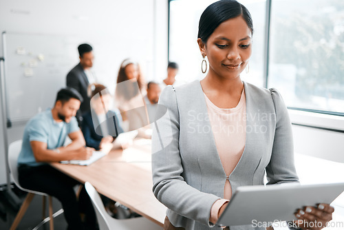 Image of Business woman, smile and tablet with leadership and meeting with group for corporate project. Team leader, management and digital tech with female person in conference room for presentation