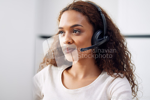 Image of Call center, woman and face of consultant at computer for customer service, technical support and CRM. Female telemarketing agent at desktop for communication, telecom consulting and sales help desk
